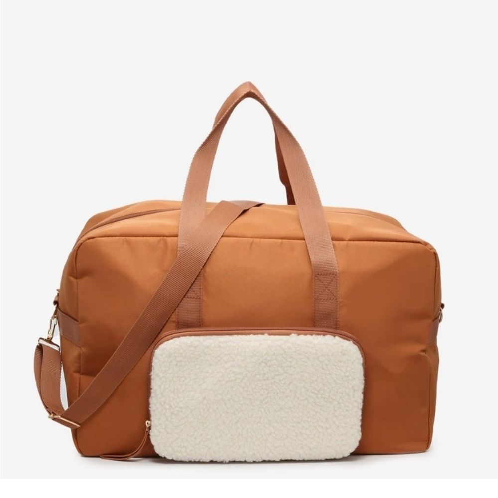 DSW Travel Weekender Duffle Bag in tawny/brown with a faux sherpa front pocket.